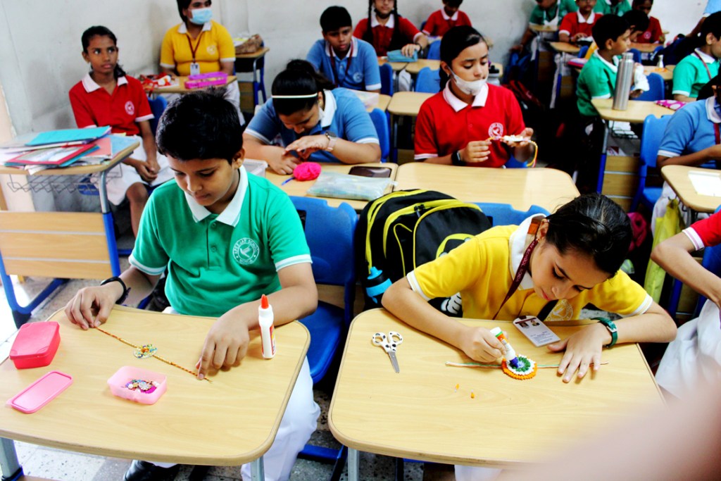 Api School Rakhsha Noida school students make colourful rakhis for Indian soldiers ...